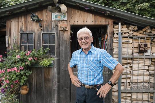 Norbert Munster by his garden workshop in Sargans, Switzerland